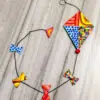 colorful kite made of Clay art wall hanging