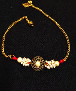 Designer metal rakhi combo with chocolates