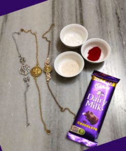 Designer metal rakhi combo with chocolates