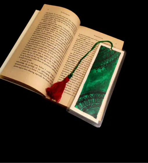 dark green handmade bookmark made of hardboard and laminated