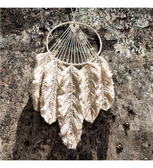 white-wall-hanging feathers made of white thread