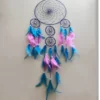 big dream catcher made of pink and sky blue feathers