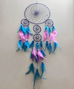 big dream catcher made of pink and sky blue feathers